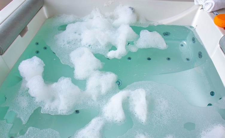hot tub maintenance foam and scum buildup